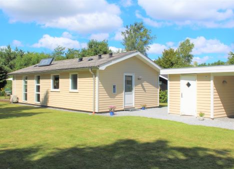 Ugens Bolig – Skønt sommerhus beliggende i Oasen